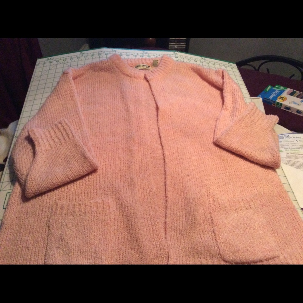 Pink cardigan sweater